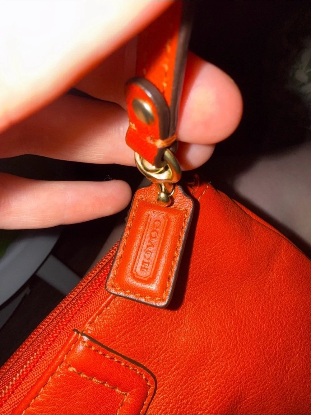 Coach Mini Wristlet in Burnt Orange Leather with Gold Hardware